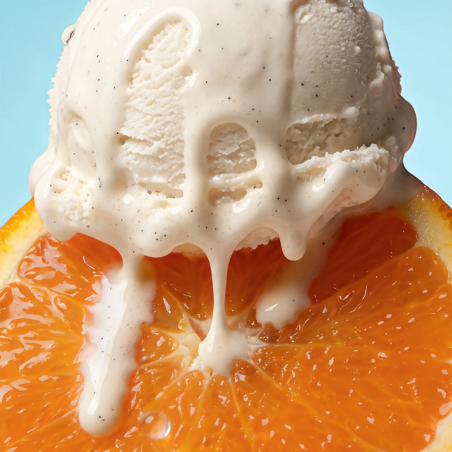 Vanilla ice cream melting over fresh orange slices, the flavour inspiration behind Magic Scoop Orange Creamsicle Electrolytes + Creatine